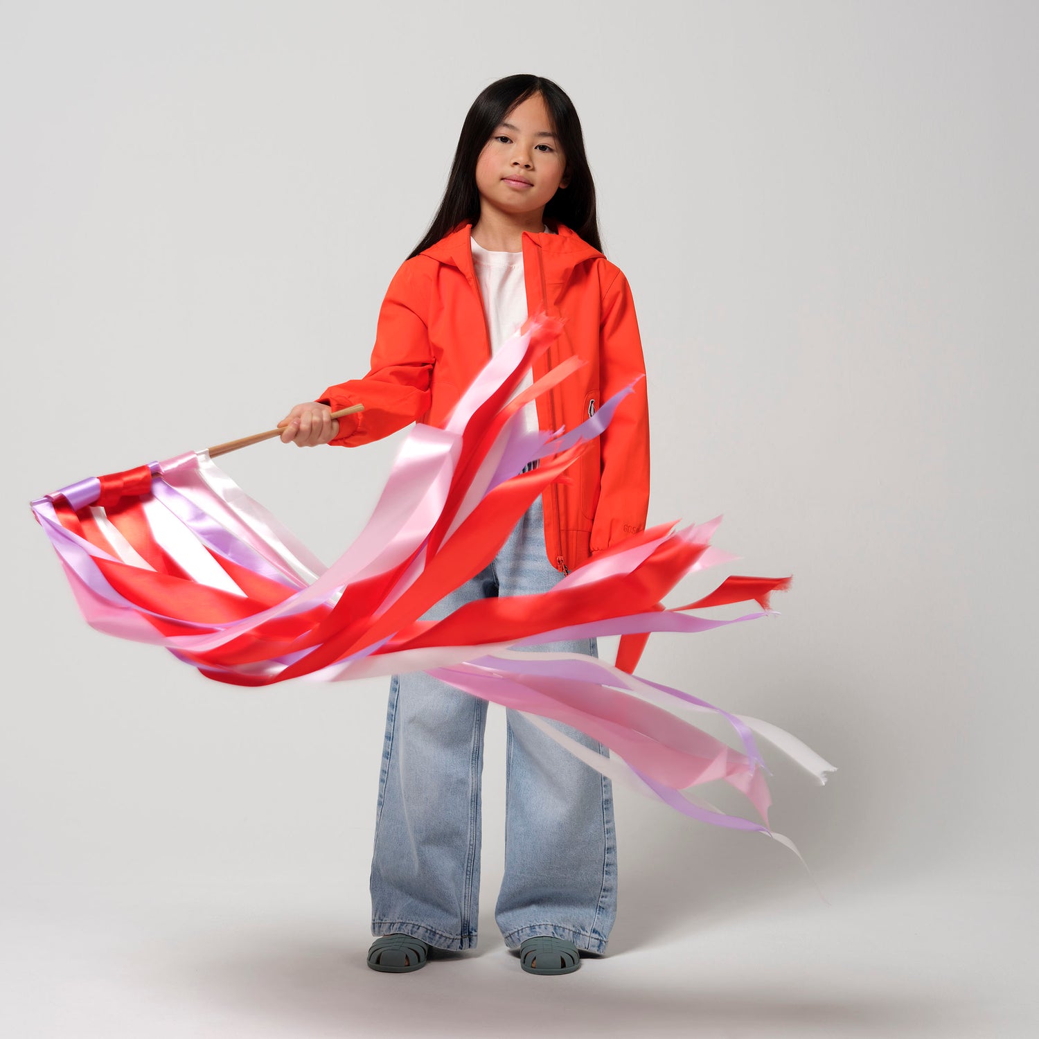 Kid wearing GOSOAKY BLUE BIRD Waterproof Jacket color poppin red - from Outerwear collection of Spring / Summer 2026