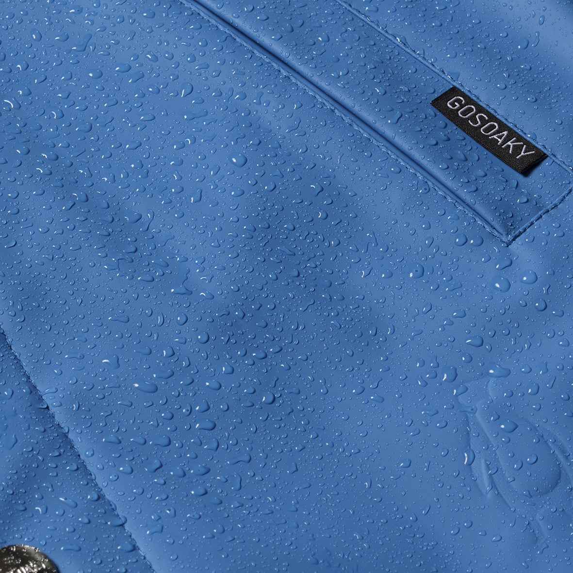 Kid wearing GOSOAKY ELEPHANT MAN Raincoat color belize blue - from Rainwear collection of Spring / Summer 2026
