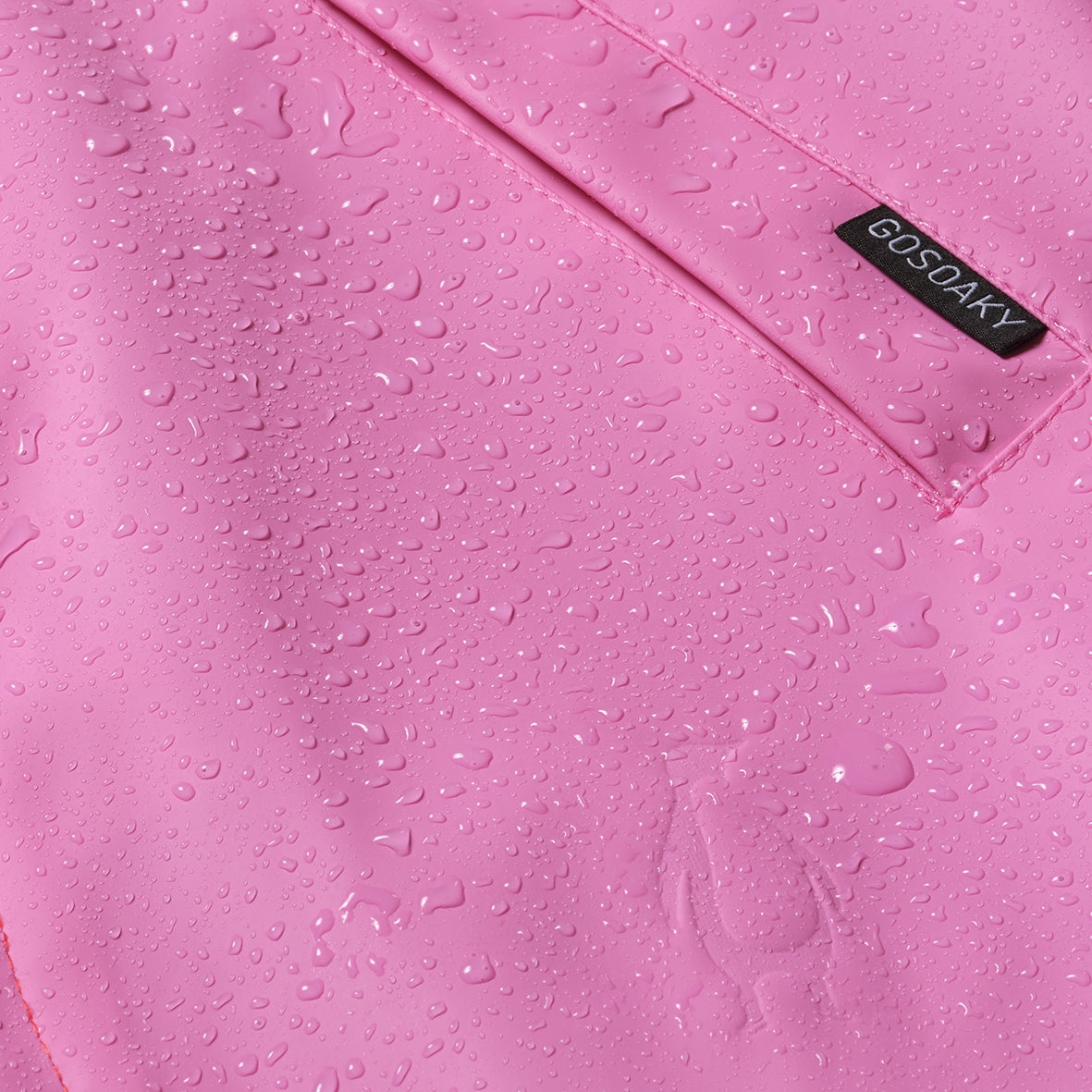 Kid wearing GOSOAKY ELEPHANT MAN Raincoat color wild orchid pink - from Rainwear collection of Spring / Summer 2026